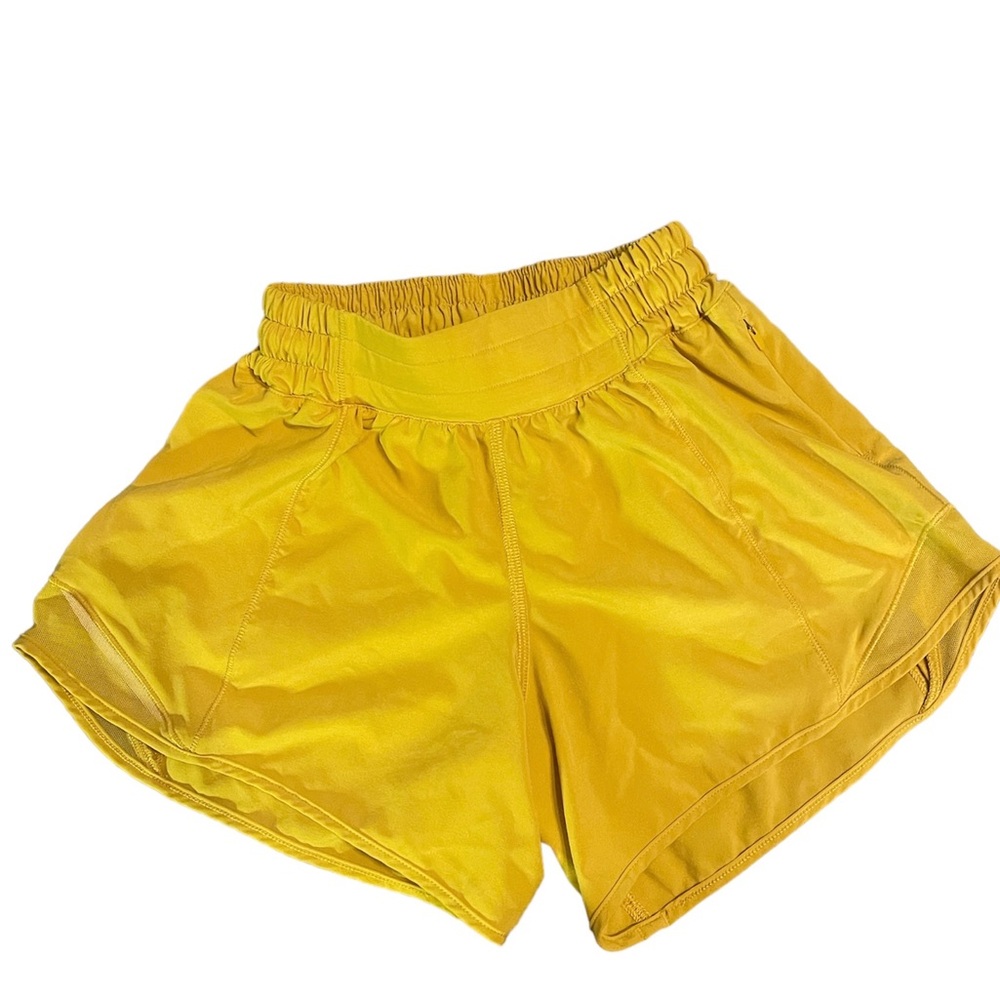 Lululemon hottie hot high rise shorts, yellow size 0 4”.  Liner cut off